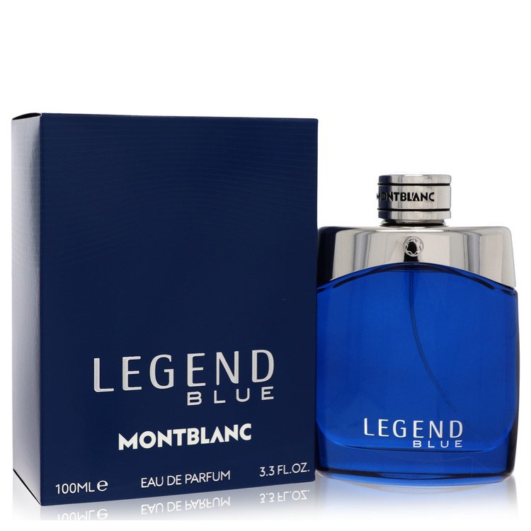 Blue glass bottle with silver cap, standing on a wooden surface, labeled Montblanc Legend Blue Eau de Parfum Spray 3.3 oz / 1