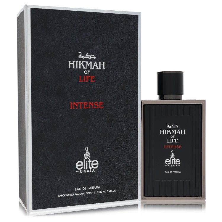 Blue glass bottle of Risala Eau De Parfum Spray 3.4 oz with gold label, standing on a wooden surface by The Fragrance Avenue