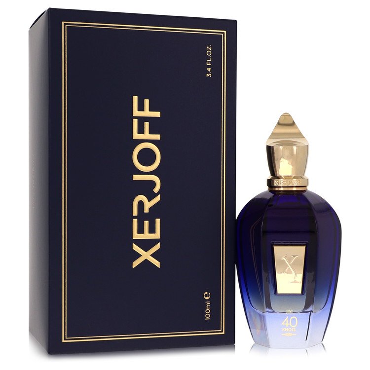 A clear glass bottle with a black cap and gold label labeled "40 Knots" by Xerjoff, standing on a white surface.