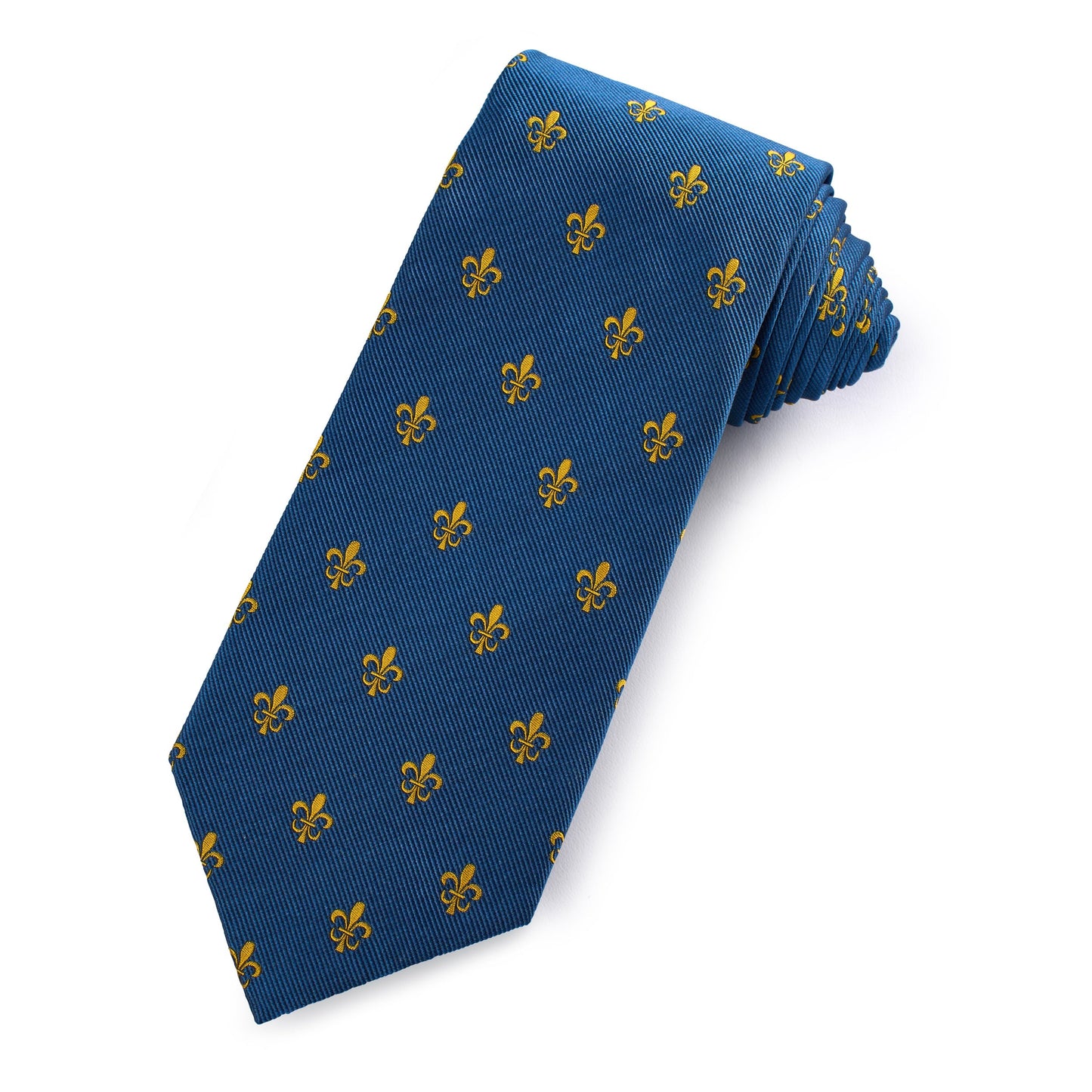 A sapphire blue silk tie with a fleur de lys pattern worn on a man's neck by Benson & Clegg.