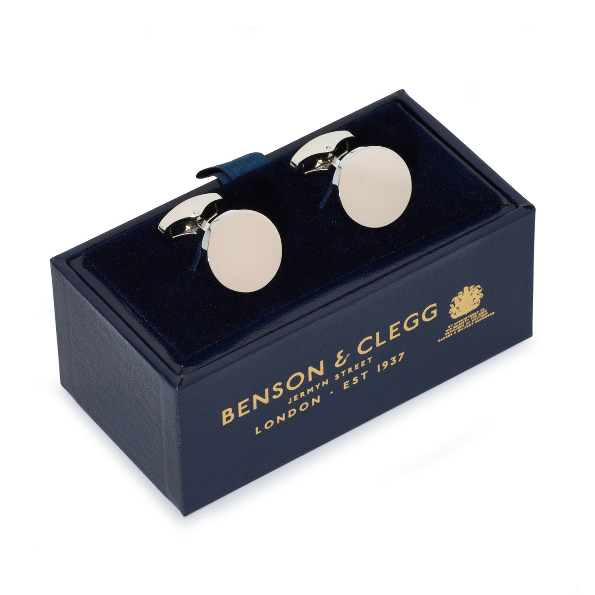 Silver round cufflinks with polished finish, styled on a white shirt cuff, by Benson & Clegg.