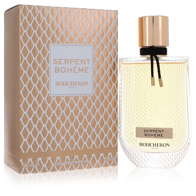 A golden perfume bottle with a snake-shaped cap resting on a white surface, labeled Boucheron Serpent Boheme Eau de Parfum Sp