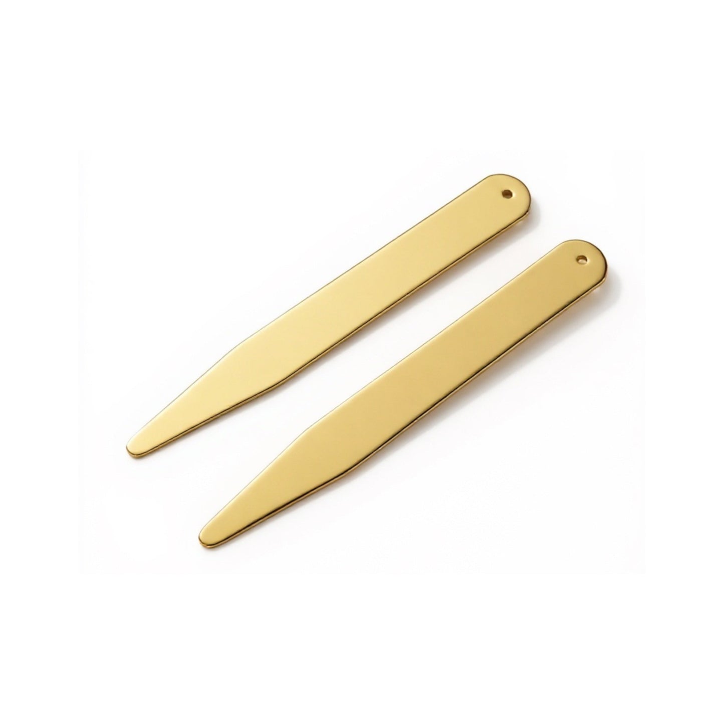 Two gold collar stiffeners on a white background, styled for formal wear by Benson & Clegg.