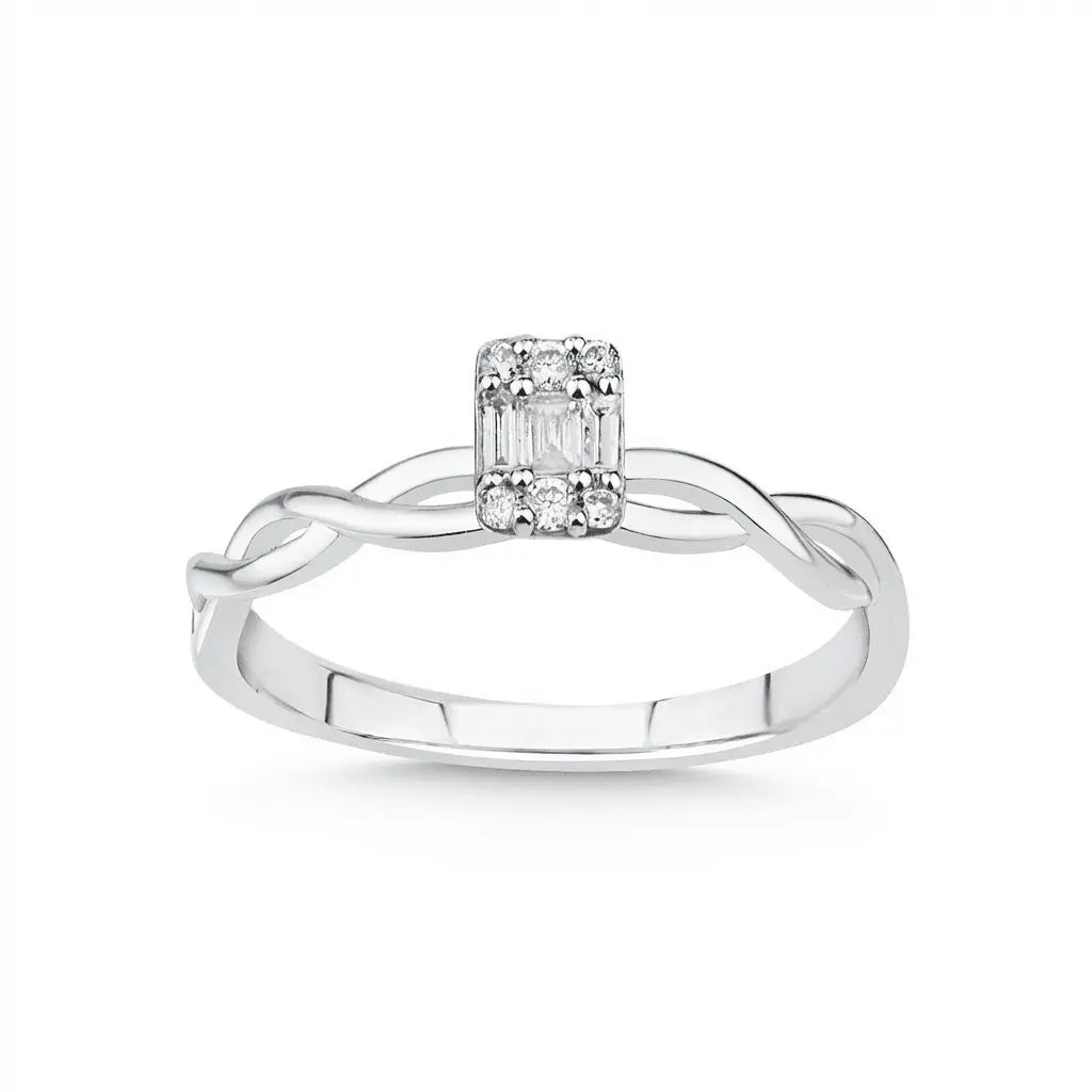 14ct white gold twisted baguette diamond ring with 0.12ct natural diamond worn on a finger by Majestic Jewellery