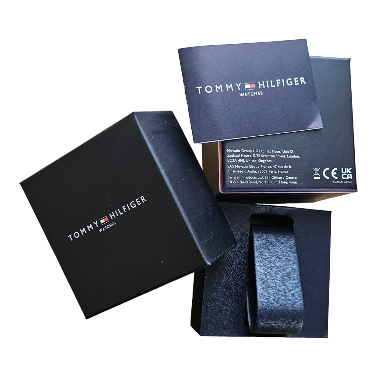 Tommy Hilfiger men's watch with gunmetal steel case and black dial, viewed from the front.