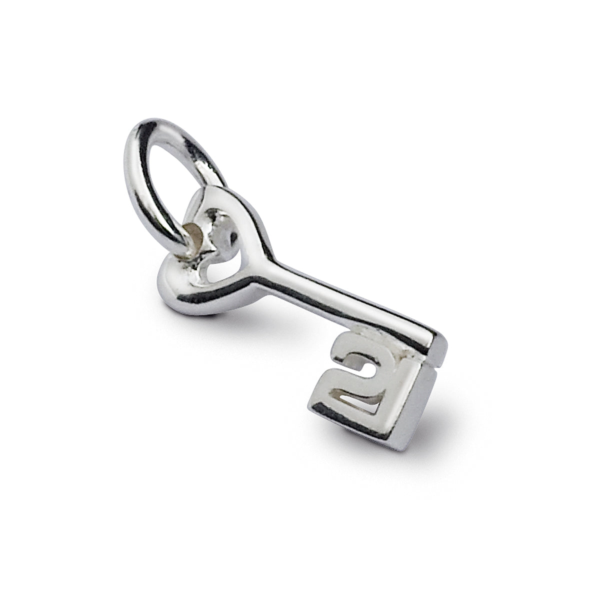 A silver 21st birthday charm displayed on a velvet background by Scarlett Jewellery.