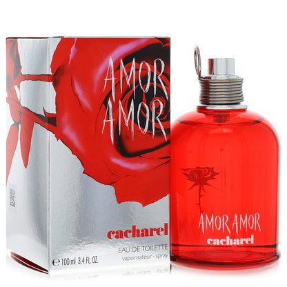 Blue glass bottle of Cacharel Amor Amor Eau De Toilette Spray for Women, 1.7 oz / 50 ml, standing on a white surface by The F