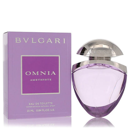 Bvlgari Omnia Amethyste perfume bottle in elegant purple glass with gold details, standing on a white surface by The Fragranc