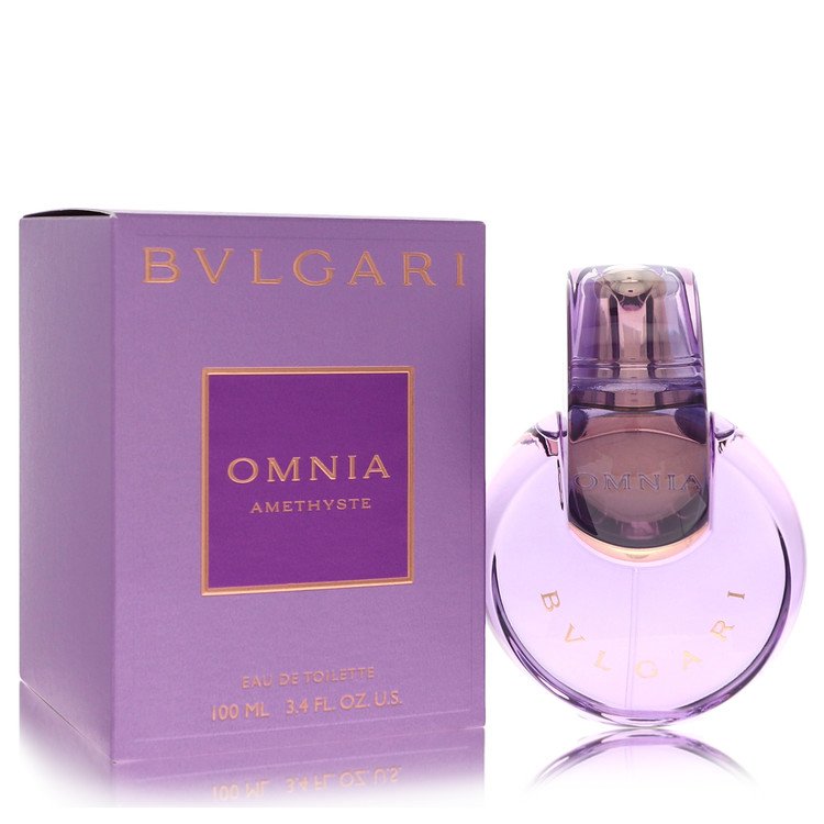 Bvlgari Omnia Amethyste perfume bottle in deep purple glass with gold details, standing on a white surface by The Fragrance A