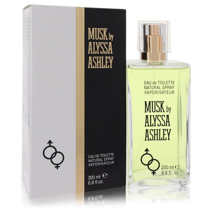 A white bottle of Alyssa Ashley Musk Eau De Toilette Spray for Women on a wooden table, 3.4 oz / 100 ml by The Fragrance Aven