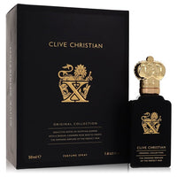 A clear glass perfume bottle with gold accents and a black cap, displayed on a white surface, labeled Clive Christian X Pure 