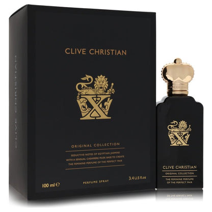 A clear glass perfume bottle with gold accents and a black cap, displayed on a white surface, labeled Clive Christian X Pure 