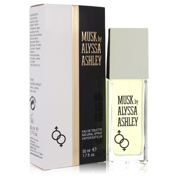 A white bottle of Alyssa Ashley Musk Eau De Toilette Spray for Women on a wooden surface by The Fragrance Avenue.