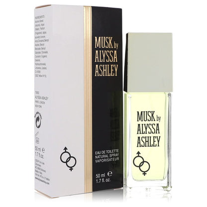 A white bottle of Alyssa Ashley Musk Eau De Toilette Spray for Women on a wooden surface by The Fragrance Avenue.