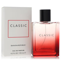 A red glass bottle of Banana Republic Classic Red Unisex Eau de Parfum Spray 4.2 oz by The Fragrance Avenue
