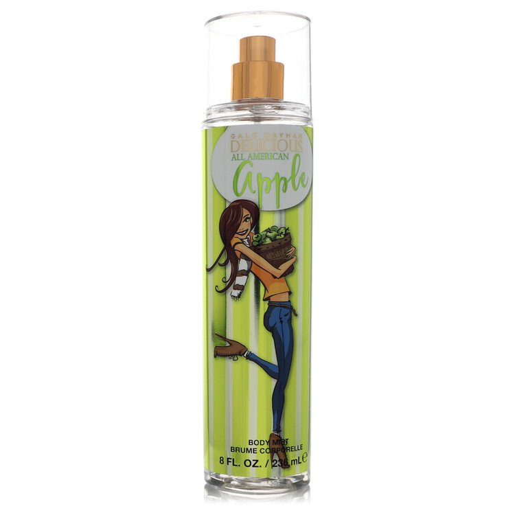 A clear glass bottle of Delicious All American Apple Body Spray with a white label and red accents, displayed on a wooden sur