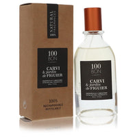 A clear glass perfume bottle with a black cap and gold label featuring a carvi and fig tree design, labeled 100 Bon Concentra