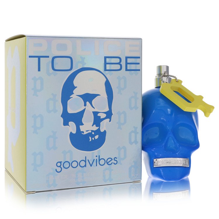 Blue glass bottle with white label featuring a peace sign and the text "To Be Good Vibes" by The Fragrance Avenue.