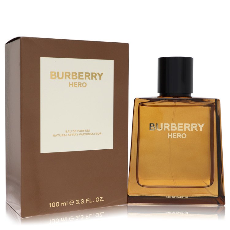 Burberry Hero Eau de Parfum Spray for Men in silver bottle with black cap, standing on a wooden surface by The Fragrance Aven