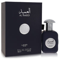 A clear glass bottle with gold accents and a white label reading "Pride Al Ameed" by The Fragrance Avenue.