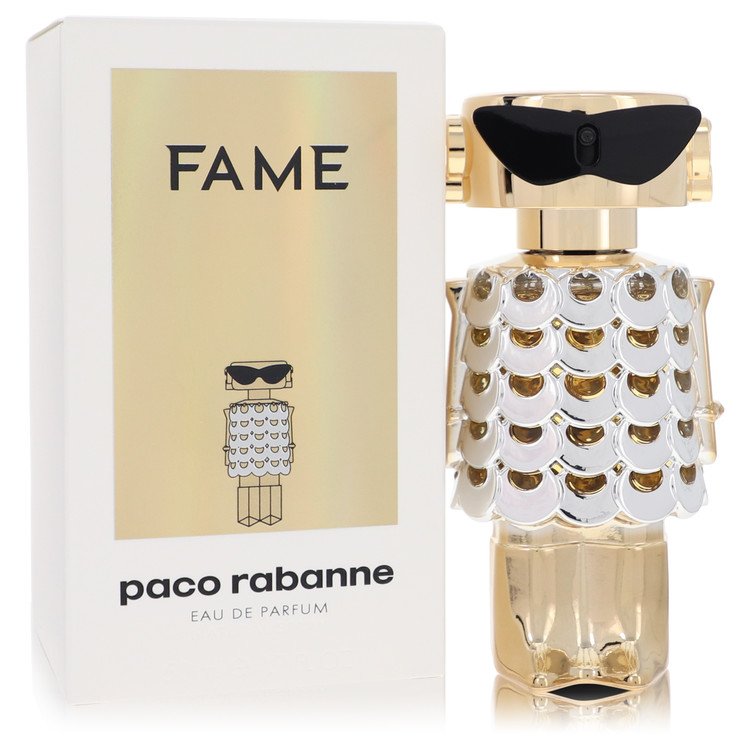 Gold bottle of Paco Rabanne Fame Eau de Parfum Spray 1.7 oz / 50 ml for Women displayed on a white background by The Fragranc