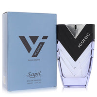 A dark blue glass bottle with gold lettering and a sleek design, standing on a wooden surface, labeled Sapil Iconic Eau De Pa