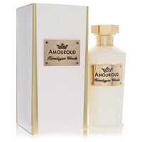A clear glass bottle with a wooden cap and golden label, labeled "Himalayan Woods" by The Fragrance Avenue.