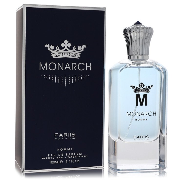 Blue glass bottle of Fariis Monarch Eau De Parfum Spray for Men, 3.4 oz / 100 ml, standing on a wooden surface by The Fragran