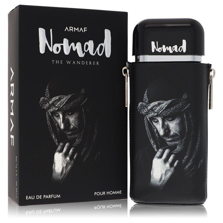 A brown leather bottle of Armaf Nomad The Wanderer Eau De Parfum Spray for Men with a minimalist label, 3.38 oz (100 ml) by T