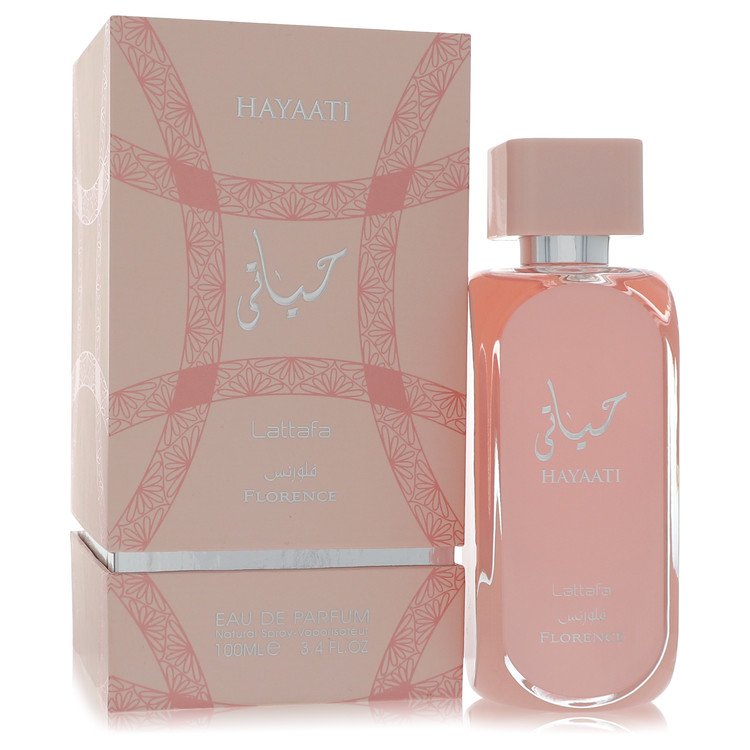A clear glass bottle with a white label and gold accents, featuring the Lattafa Hayaati Florence unisex eau de parfum spray 3
