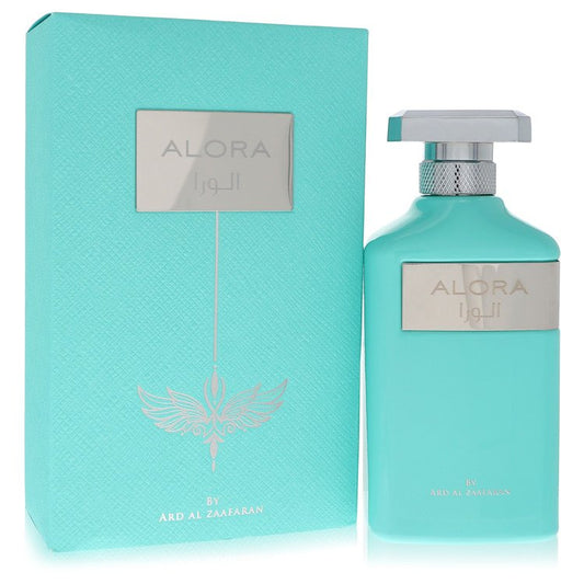 A clear glass bottle with a gold cap and dark amber liquid, labeled Al Zaafaran Alora Eau De Parfum Spray 3.4 oz / 100 ml for