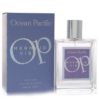 Blue bottle with mermaid design holding a spray of ocean-themed perfume by The Fragrance Avenue