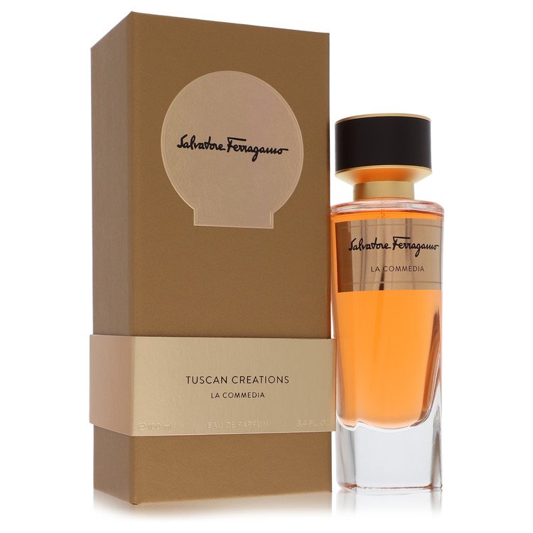 Blue glass bottle of Salvatore Ferragamo La Commedia Unisex Eau de Parfum Spray 3.3 oz / 100 ml with minimalist design by The