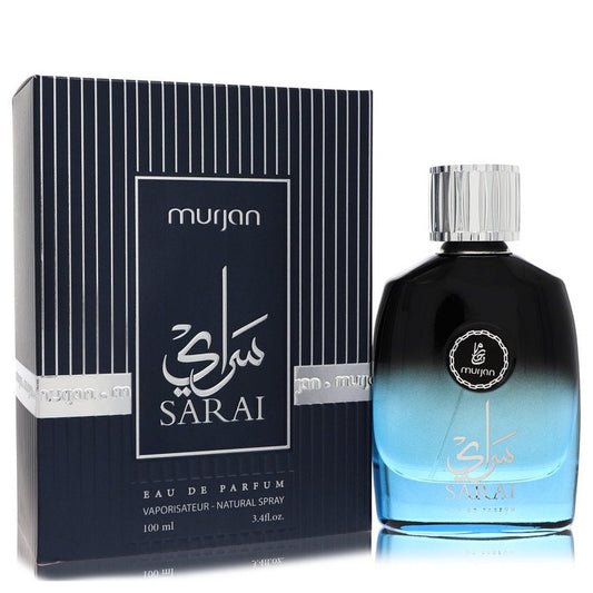 A clear glass bottle with a gold cap and black label, labeled "Dumont Murjan Sarai" by Dumont Paris, standing on a wooden sur