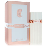 Dumont Diva Chic Eau de Parfum Spray in gold bottle with floral design on white background by The Fragrance Avenue.