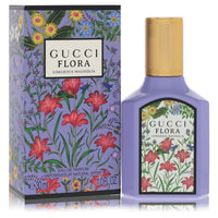 Gucci Flora Gorgeous Magnolia perfume bottle with floral design on white background by The Fragrance Avenue.