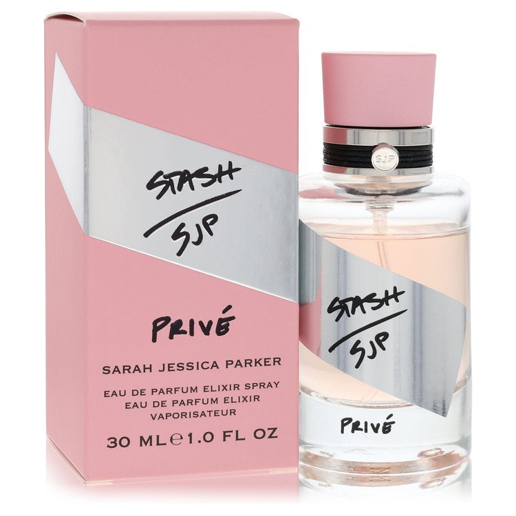 Blue glass bottle with gold cap, standing on a white surface, labeled "Stash Prive" by The Fragrance Avenue.