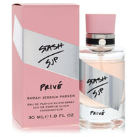 Blue glass bottle with gold cap, standing on a white surface, labeled "Stash Prive" by The Fragrance Avenue.