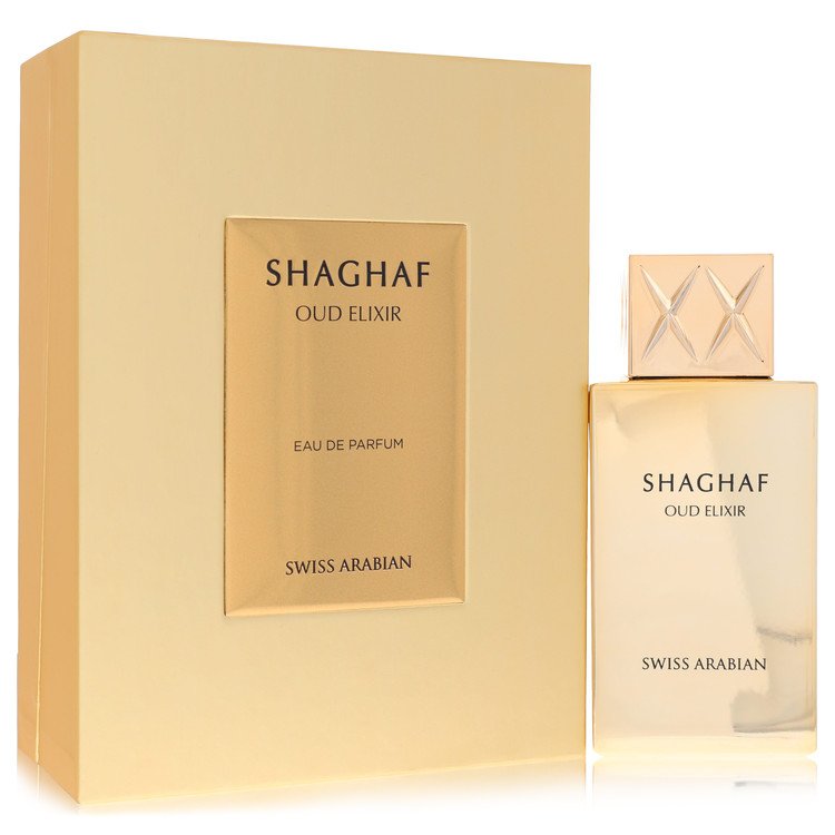 A clear glass bottle of Swiss Arabian Shaghaf Oud Elixir Eau De Parfum Spray with a golden cap and dark amber liquid, standin