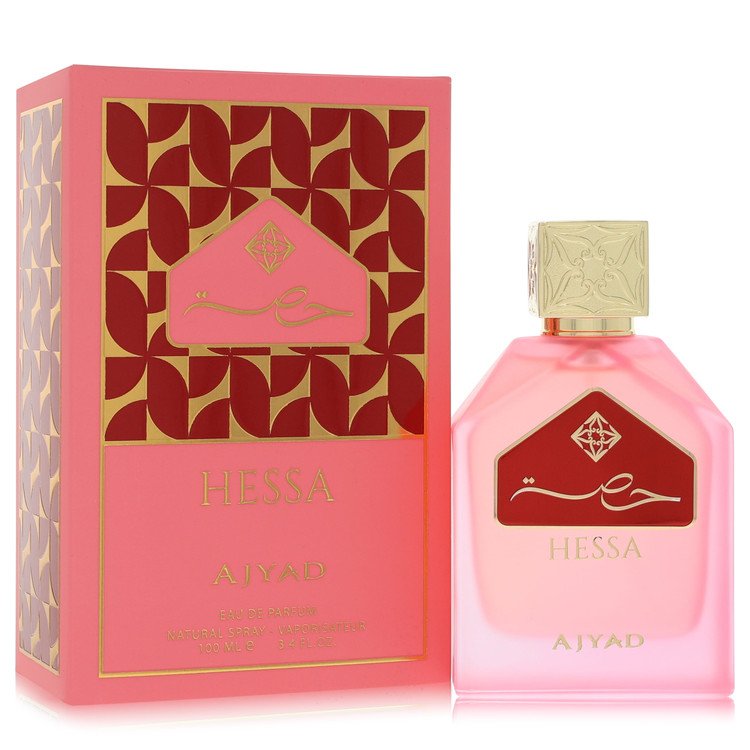 A glass perfume bottle with gold accents and a white label featuring the name Ajyad Eau De Parfum Spray for Women by The Frag