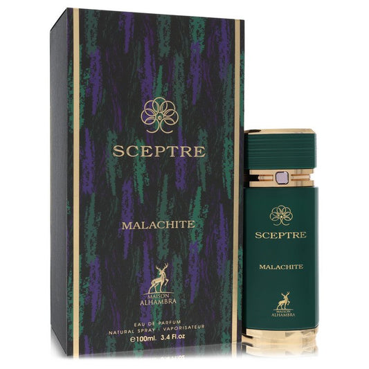 A clear glass perfume bottle with a green malachite cap and gold accents, displayed on a white background, by The Fragrance A