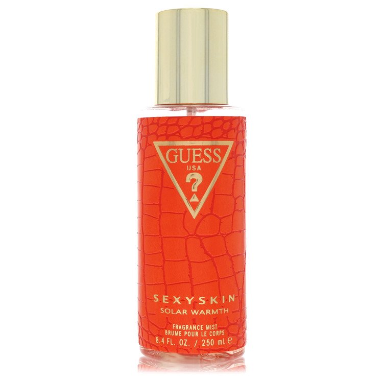 Blue glass bottle of Guess Sexy Skin Solar Warmth fragrance mist 8.4 oz for women by The Fragrance Avenue
