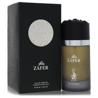 Blue glass bottle with black cap, standing on a wooden surface, labeled Risala Eau De Parfum Spray for Men by The Fragrance A