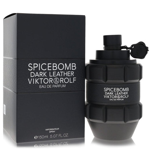 Dark leather fragrance bottle with gold accents, standing on a white surface, labeled Viktor & Rolf Spicebomb Dark Leather Ea