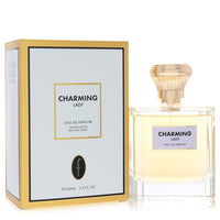 A clear glass perfume bottle with a pink cap and gold accents, labeled Flavia Charming Lady Eau De Parfum Spray 3.4 oz / 100 