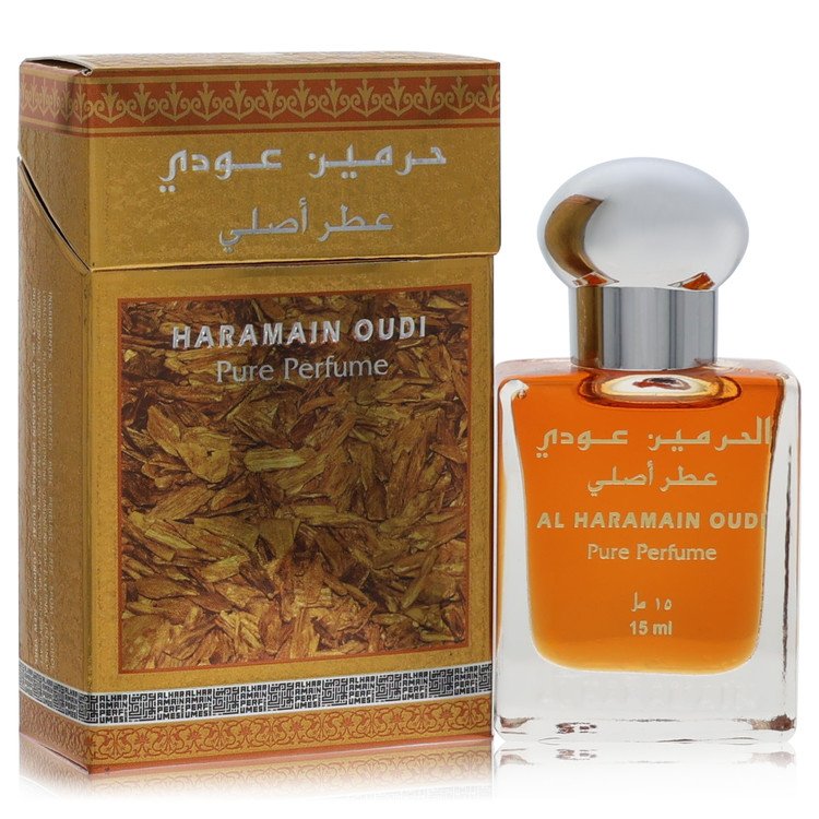 Blue glass bottle of Al Haramain Oudi Eau De Parfum Spray 0.51 oz / 15 ml for Men on a white background by The Fragrance Aven