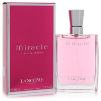 Miracle by Lancome eau de parfum spray in gold bottle with floral design, 1.7 oz for women by The Fragrance Avenue.