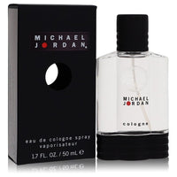 Blue glass bottle of Michael Jordan Men's Cologne Spray 1.7 oz (50 ml) standing on a black surface by The Fragrance Avenue.