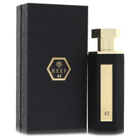 Blue glass bottle of Reef 42 fragrance by Reef Parfum spray 3.3 oz for women by The Fragrance Avenue