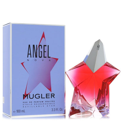A clear glass perfume bottle with a gold cap and black label, standing on a white surface, labeled "Angel Nova" by Thierry Mu